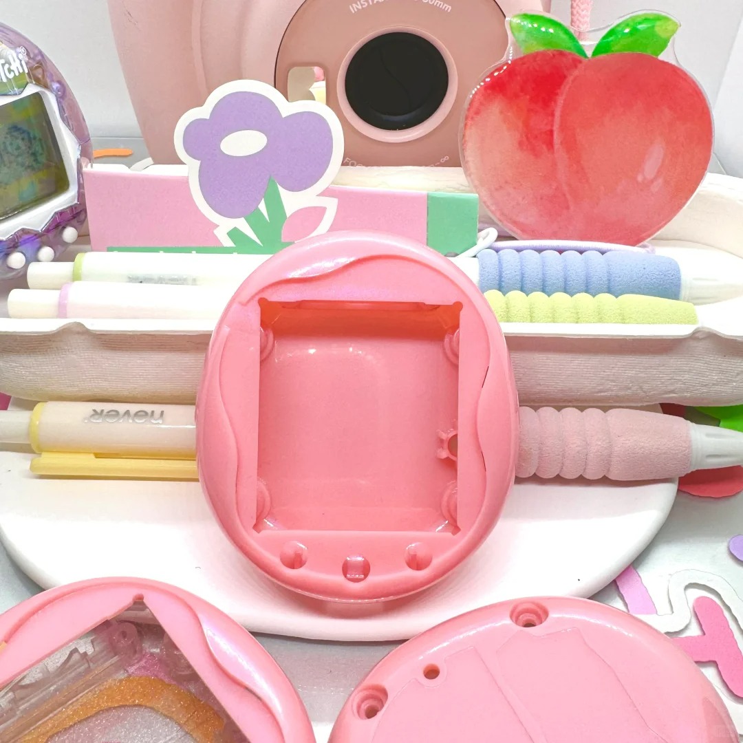 新しい本物のバンダイたまごっちユニ交換用ケースとたまごっちの - Bandai Model Tamagotchi のレビューと価格